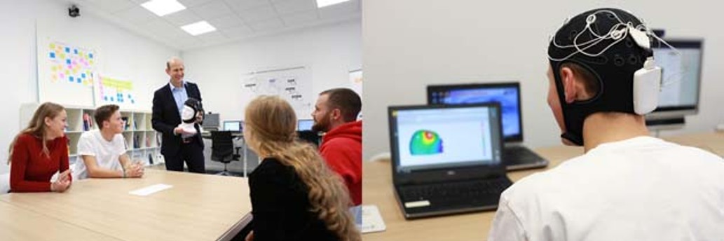 Lehrsituation Studierende und ein Professor
Sudirender sitzt vor einem Computer